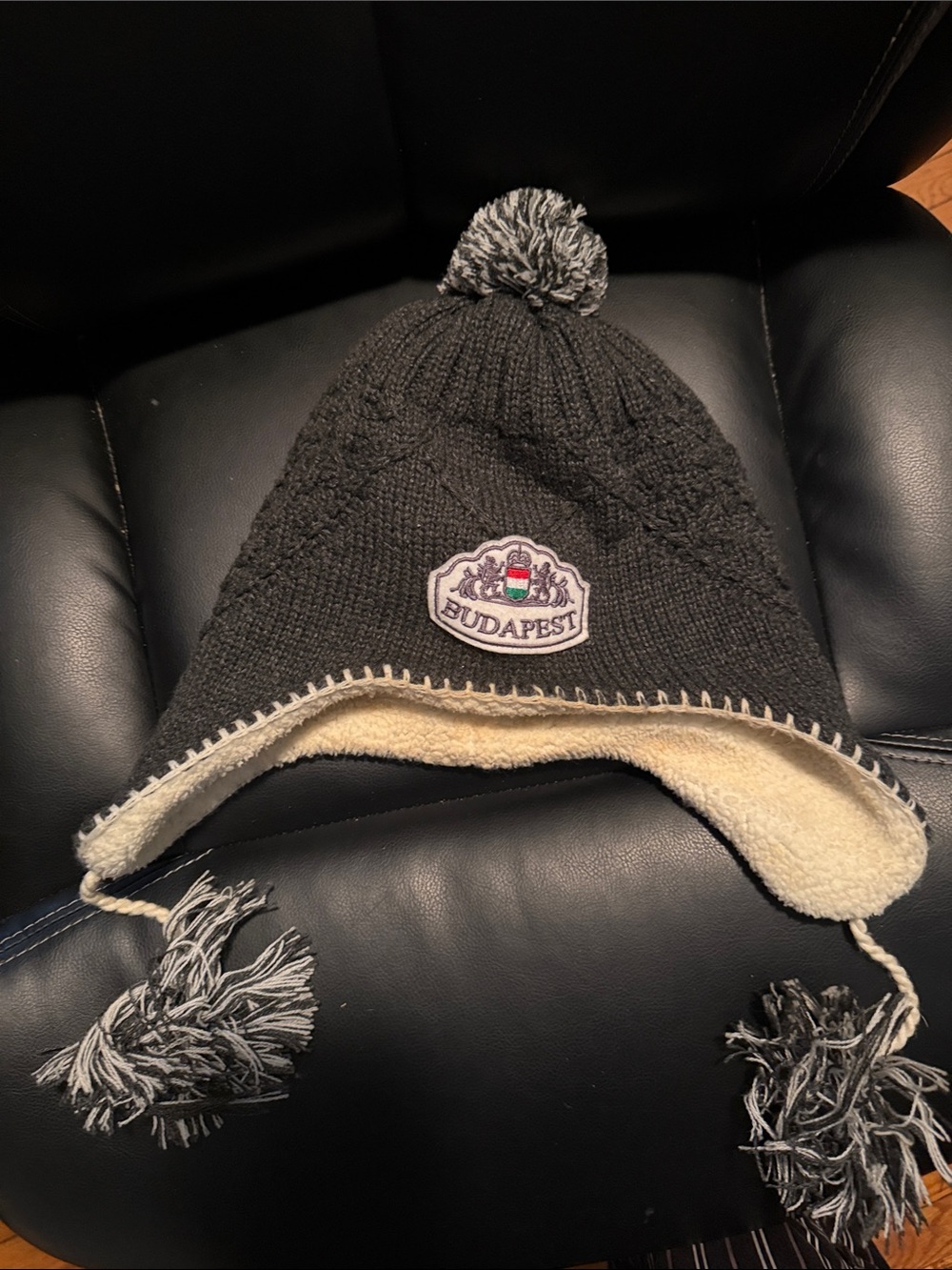 Knit Earflap Beanie Hat - Black with Cream Lining. Budapest, Hungary